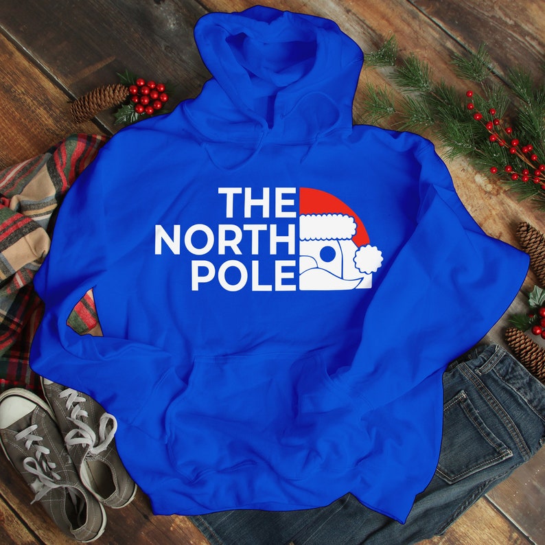 HOODIES (5226 ) The NORTH Pole Merry Christmas Xmas Santa Elf Christmas -Youth Hoodies No drawstring to conform to EU regulations.