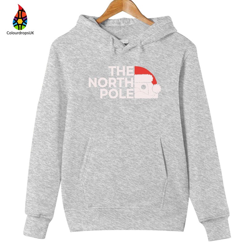 HOODIES (5226 ) The NORTH Pole Merry Christmas Xmas Santa Elf Christmas -Youth Hoodies No drawstring to conform to EU regulations.