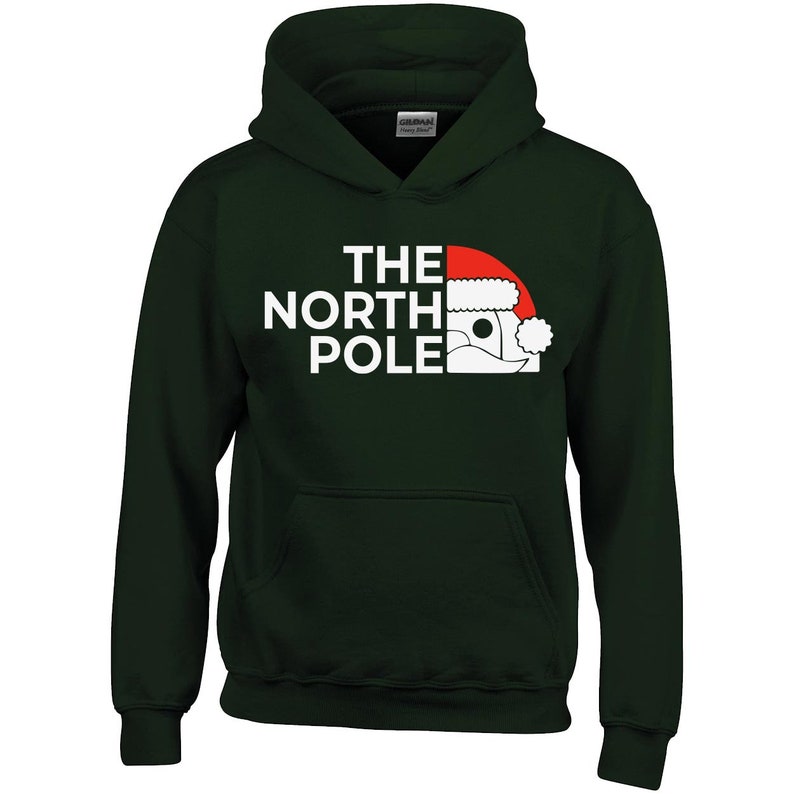 HOODIES (5226 ) The NORTH Pole Merry Christmas Xmas Santa Elf Christmas -Youth Hoodies No drawstring to conform to EU regulations.