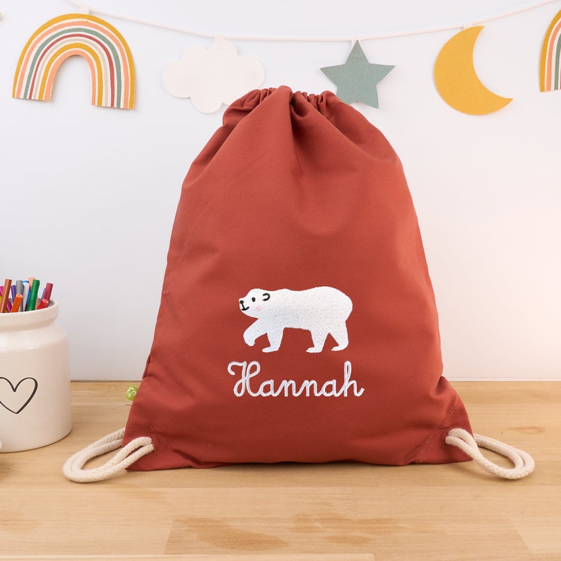 Rust-colored organic children's gym bag personalized with name