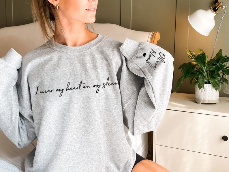 I Wear My Heart On My Sleeve Sweatshirt, Mothers Day Shirt, Mama Sweatshirt with Kids Name on Sleeve, Personalized Mother Day Gift for Mom