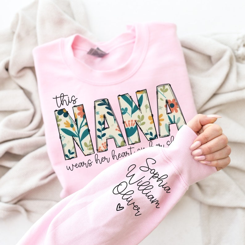 Custom Sweatshirt for Nana, Christmas Gift for Nana, I Wear My Heart On My Sleeve, Nana Sweatshirt with Grandkids Name on Sleeve, Nana Gift