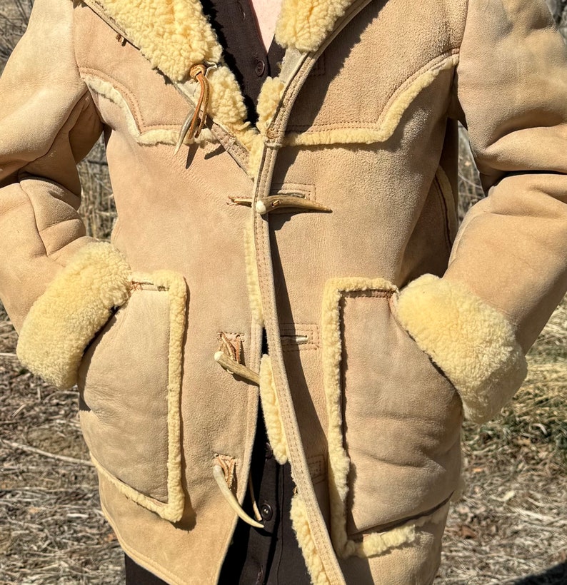 Vtg Marlboro Man authentic sheepskin coat with antler buttons! SZ 40