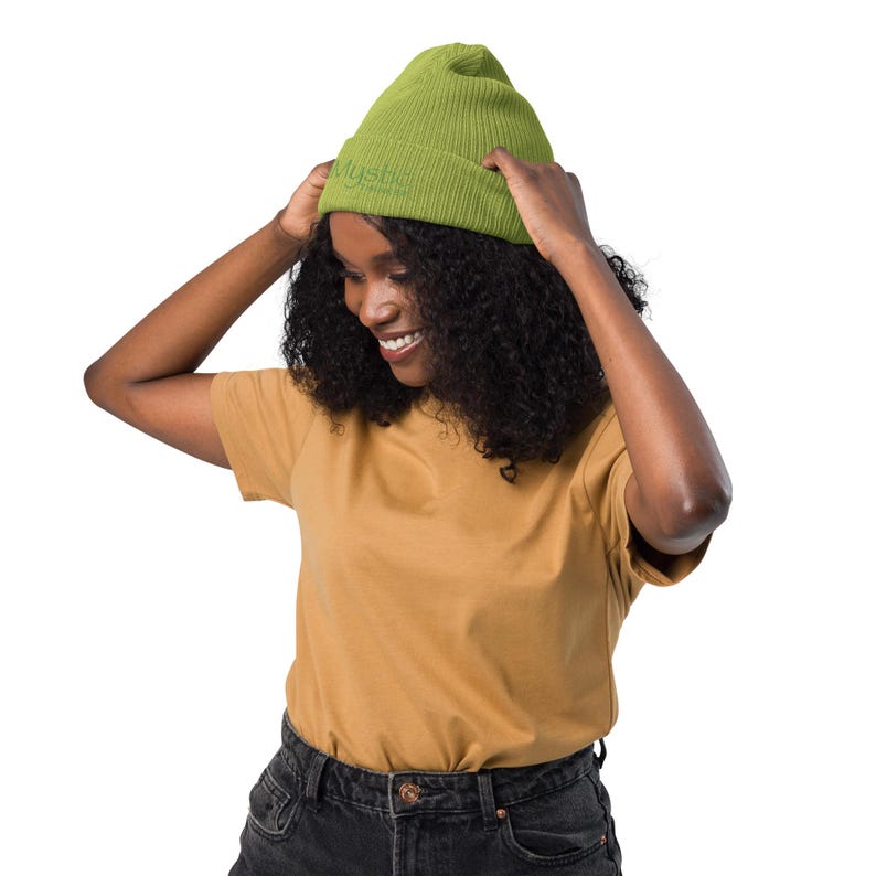 Organic cotton beanie cap covers your “OptiMystic Thinker” head with subtle style.